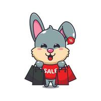 cute rabbit with shopping bag in black friday sale cartoon vector illustration