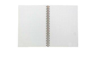 Grid paper open notebook isolated on white background in top view photo
