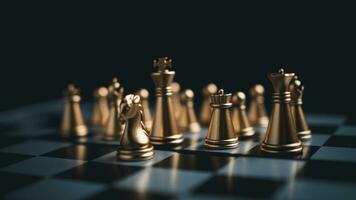 Gold and silver chess pieces in chess board game for business comparison. Leadership concepts, human resource management concepts. photo