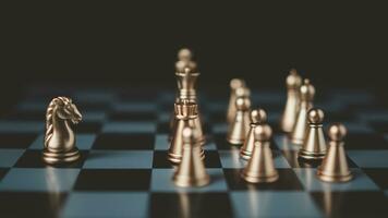 Gold and silver chess pieces in chess board game for business comparison. Leadership concepts, human resource management concepts. photo