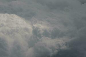 clouds over the sky and sea photo