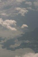 clouds over the sky and sea photo