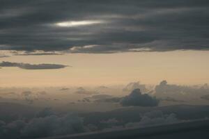 clouds over the sky by sunset photo