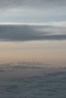 clouds over the sky by sunset photo
