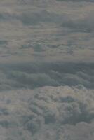 clouds over the sky and sea photo