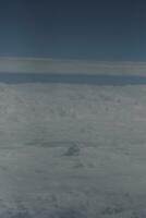 clouds over the sky and sea photo