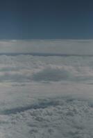 clouds over the sky and sea photo