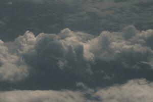 clouds over the sky and sea photo