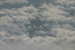 clouds over the sky and sea photo