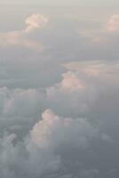 clouds over the sky by sunset photo