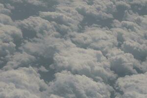 clouds over the sky and sea photo
