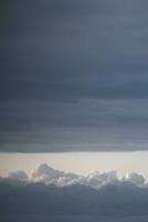 clouds over the sky by sunset photo