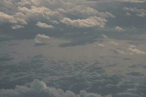 clouds over the sky and sea photo