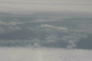 clouds over the sky and sea photo