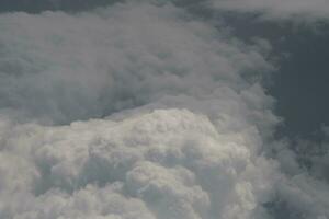 clouds over the sky and sea photo