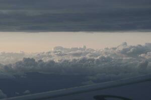 clouds over the sky by sunset photo