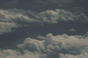 clouds over the sky and sea photo