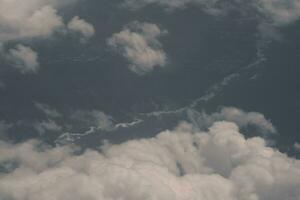 clouds over the sky and sea photo