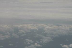 clouds over the sky and sea photo