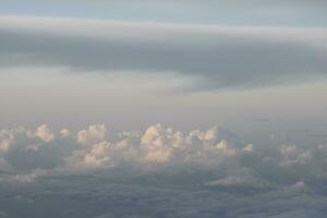 clouds over the sky by sunset photo