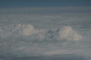 clouds over the sky and sea photo