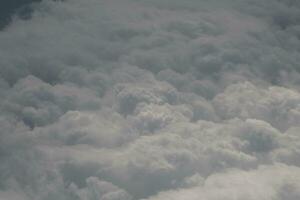 clouds over the sky and sea photo