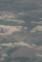 clouds over the sky and sea photo
