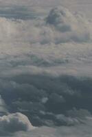clouds over the sky and sea photo