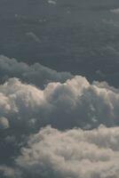clouds over the sky and sea photo