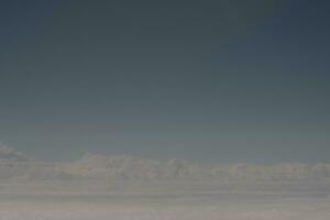 clouds over the sky and sea photo