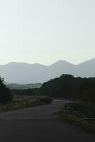 road in the mountains and countryside photo