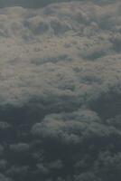 clouds over the sky and sea photo