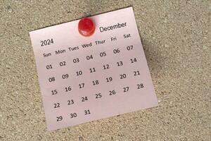 diciembre 2024 calendario en pegajoso nota. recordatorio y 2024 nuevo año concepto foto