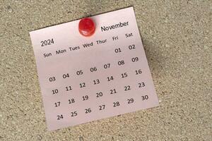 noviembre 2024 calendario en pegajoso nota. recordatorio y 2024 nuevo año concepto foto