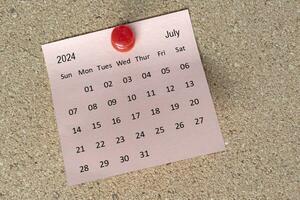 July 2024 calendar on sticky note. Reminder and 2024 new year concept photo