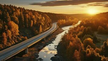 Overhead View of a Road Winding by the River Amidst Fall Foliage. Generative AI photo