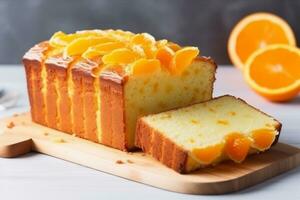 Orange homemade pound cake. Moist loaf with orange zest on bright background. Generative AI photo