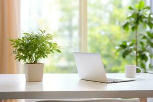 Minimalist simple office workspace with a laptop and a potted plant in soft natural light. Generative AI photo