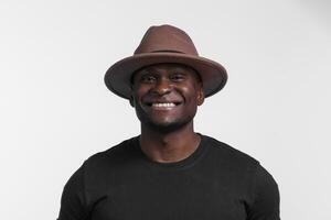 Close up portrait of happy african american man laughing photo