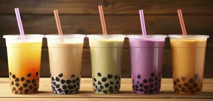 Plastic cups of different tasty bubble tea on wooden background. Generative AI photo