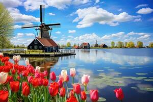 vistoso tulipanes y molinos de viento en el lago en Holanda, paisaje con tulipanes en zaanse chans, Países Bajos, Europa, ai generado foto