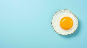 Tasty sunny side up fried egg isolated on a blue background, top view. Ai Generative photo