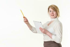 Businesswoman holding clipboard, pointing up finger with pencil. Concept planning, business strategy photo