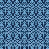 A vibrant abstract ikat pattern in shades of blue and black vector