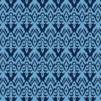 A vibrant abstract ikat pattern in shades of blue and black vector