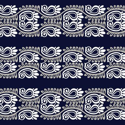A blue and white pattern with elegant swirling designs