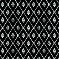 A black and white pattern with leaves vector