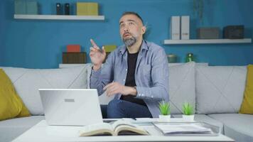 Home office worker generating solutions and doing calculations. video