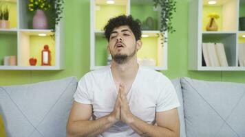 The man, who is sweating from the heat at home, is overwhelmed. video