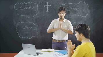 Christian teacher and student with mental retardation pray. video